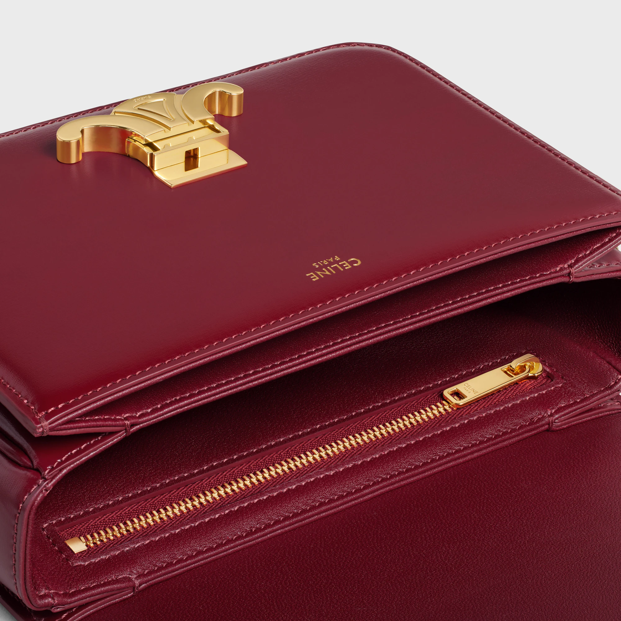 28eee298a2eb95785acbe2a07b8f0556.webp TEEN TRIOMPHE BAG IN SHINY CALFSKIN - Image 1