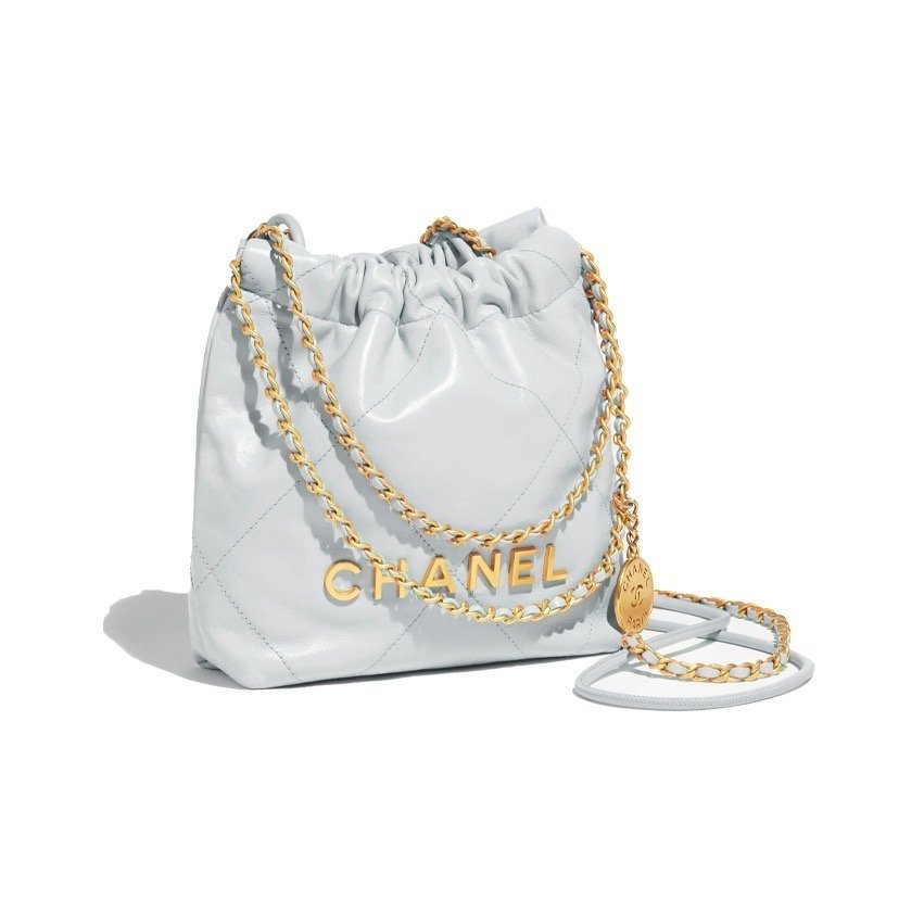 36513ccfcfbec31318990cfc1b7ef417.jpg CHANEL 22 MINI HANDBAG LIGHT BLUE - Image 1