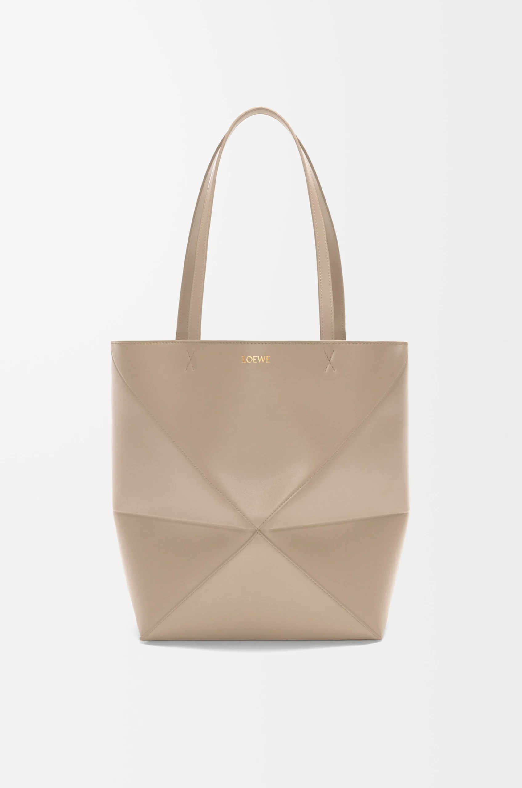 70abcc1500087ecca2033a5b0138748f-scaled-1.webp Medium Puzzle Fold tote in shiny calfskin - Image 1