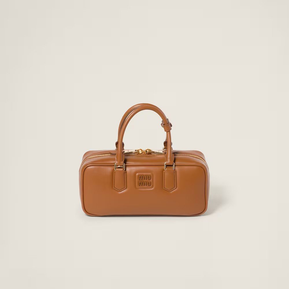 ad44c404f78e49042b9efb64b71b90c6.jpg Arcadie Leather Large Handbag Cognac color - Image 1